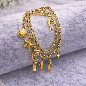 Gold Tone 3-Strand Nautical Charm Bracelet – Starfish Shell Dolphin